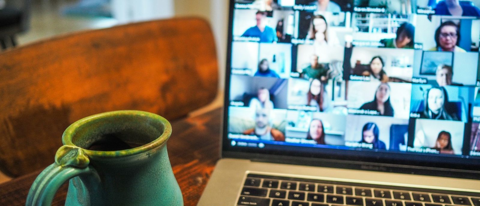 A laptop screen showing a group video call